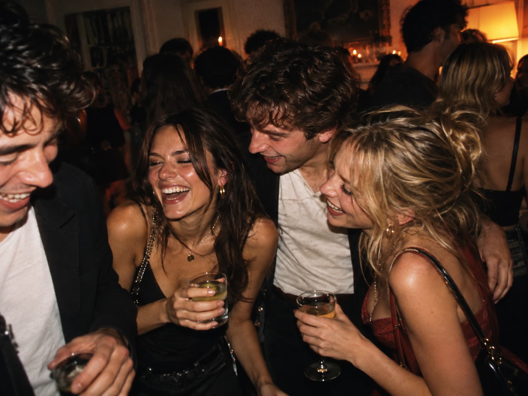 Friends laughing together at Lola's birthday